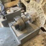 Dryfit of new baseplate over existing stone plinth