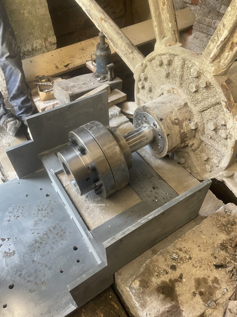 Dryfit of new baseplate over existing stone plinth